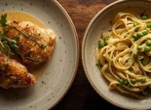-Classic Chicken Limoné aside Creamy Lemon Arugula Pasta with Fresh Peas and Fresh handmade Fettuccine (1)